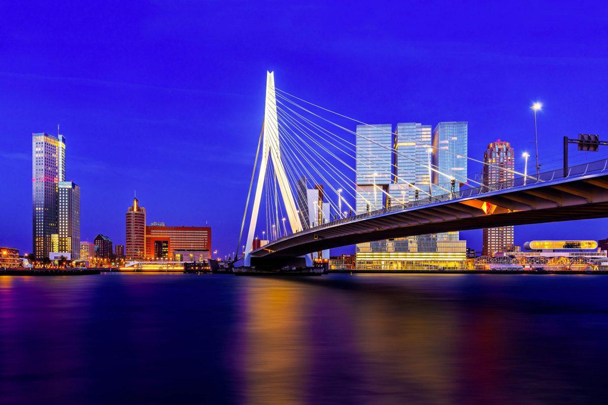 The famous Erasmus Bridge over the Nieuwe Maas is also part of the official logo of the city of Rotterdam, Netherlands - © mihaiulia / Shutterstock