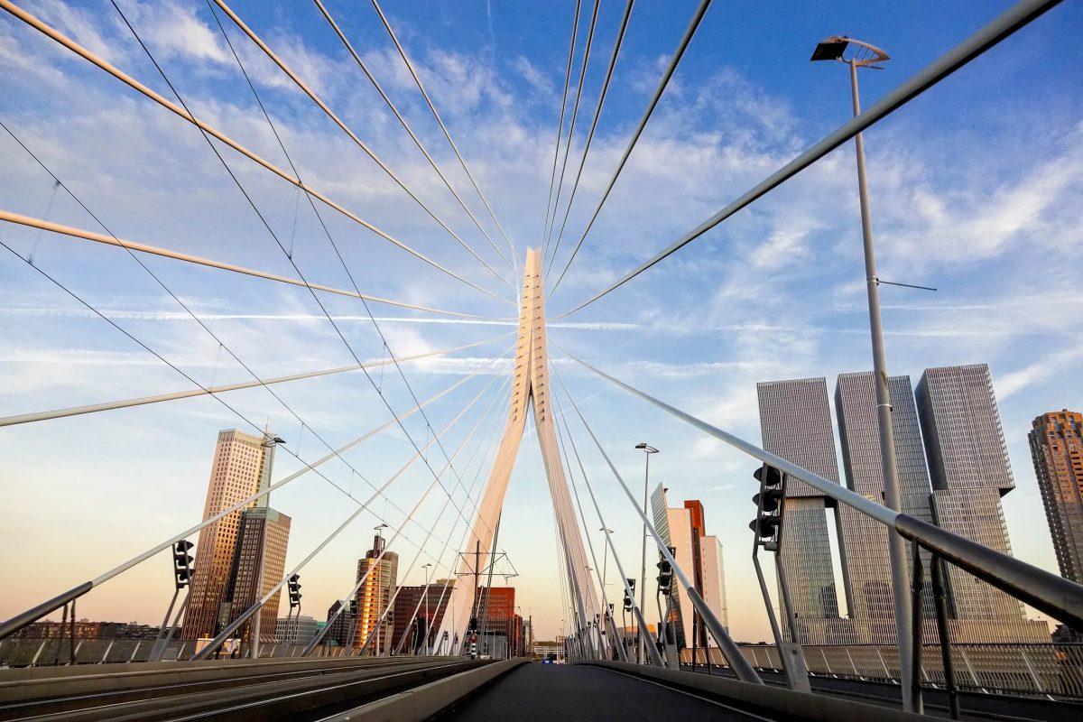 Rotterdam's famous Erasmus Bridge has two pedestrian walkways, two bike lanes, streetcar tracks and two car lanes, Netherlands - © Henryk Sadura / Shutterstock